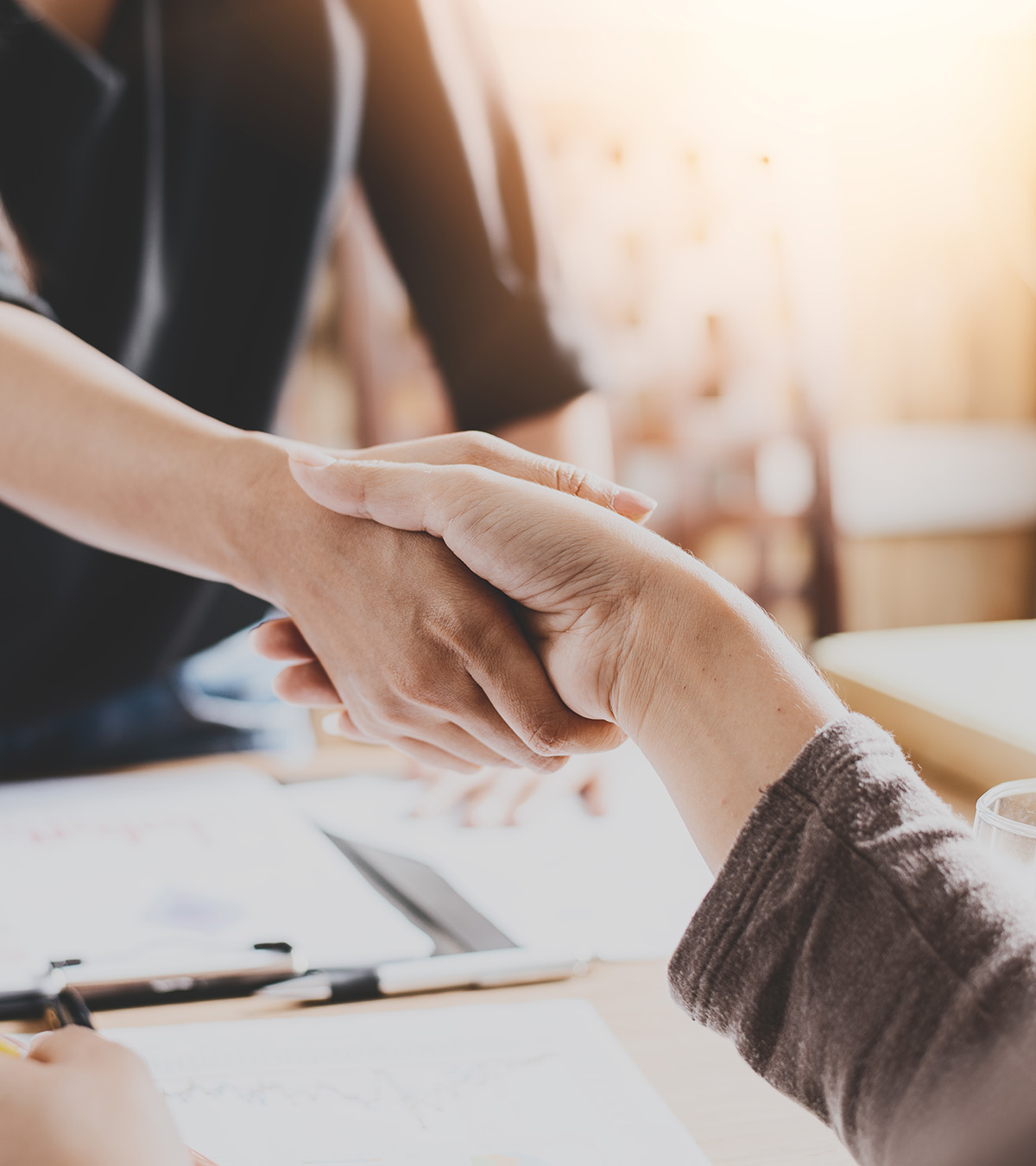 Negotiating,Business,image,Of,Businesswomen,Handshaking,happy,With,Work,the,Woman,She,Is